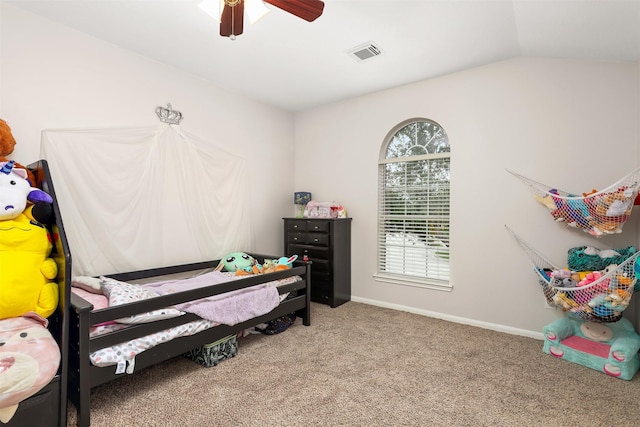 bedroom with vaulted ceiling, carpet, and ceiling fan