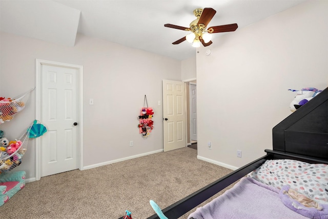 unfurnished bedroom featuring ceiling fan and carpet flooring