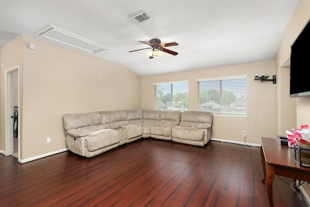 living room with lofted ceiling, dark wood-type flooring, and ceiling fan