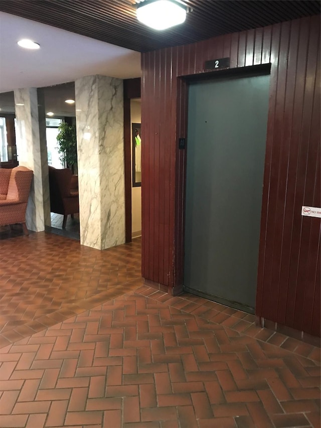7510 Hornwood Dr Unit 201, Houston, TX 77036 - building lobby with wood walls