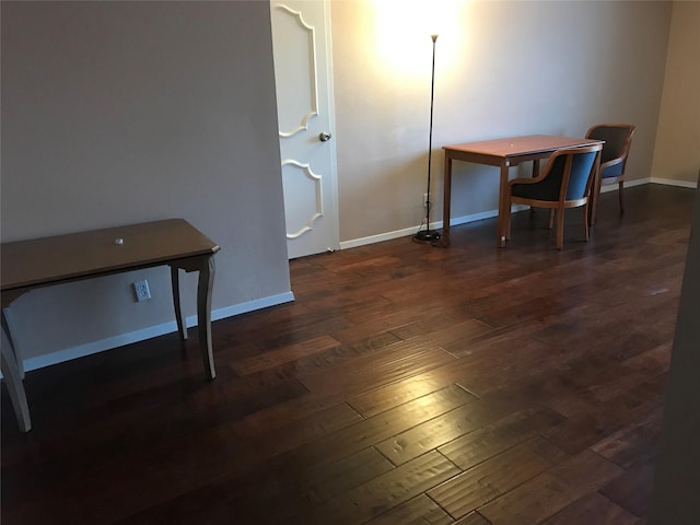 dining area with dark wood-type flooring