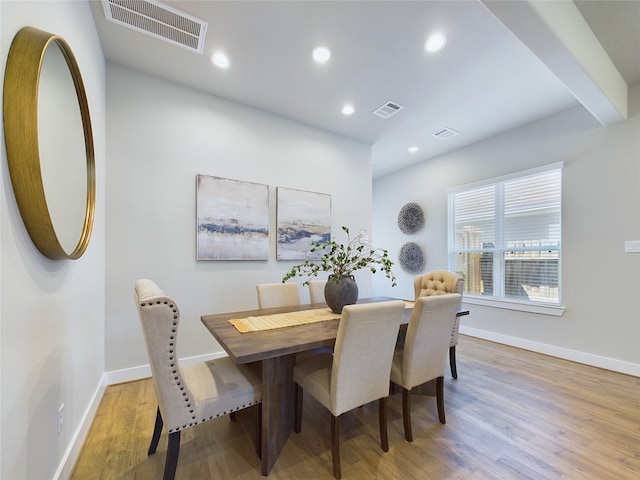 dining room with light hardwood / wood-style flooring