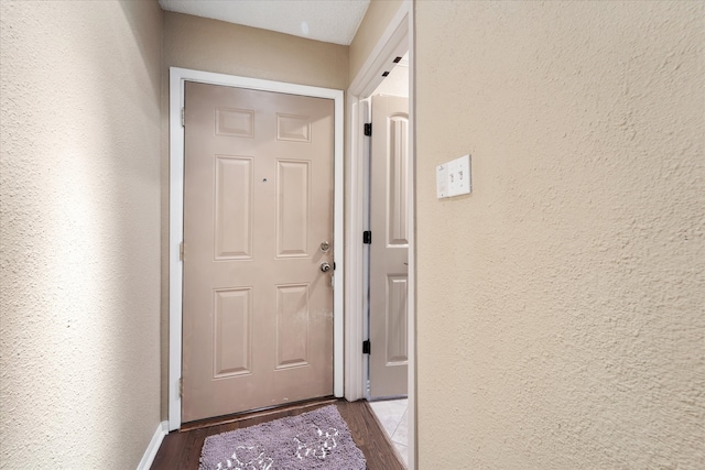 doorway featuring hardwood / wood-style floors