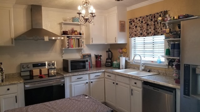 kitchen featuring white cabinetry, wall chimney range hood, crown molding, sink, and appliances with stainless steel finishes