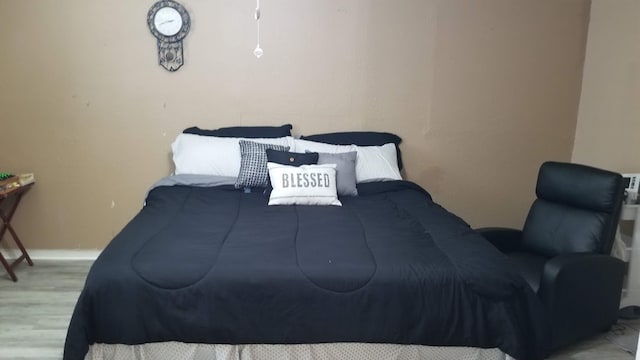 bedroom featuring light hardwood / wood-style floors