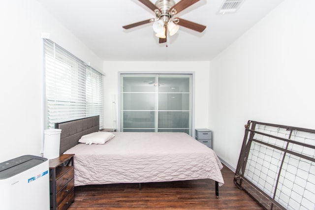 bedroom featuring hardwood / wood-style flooring and ceiling fan