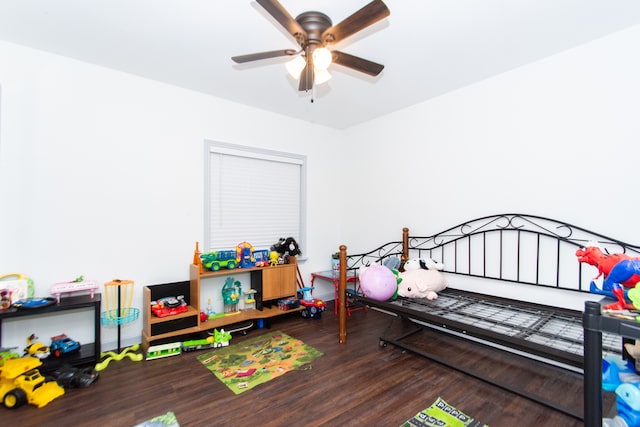 bedroom featuring hardwood / wood-style flooring and ceiling fan