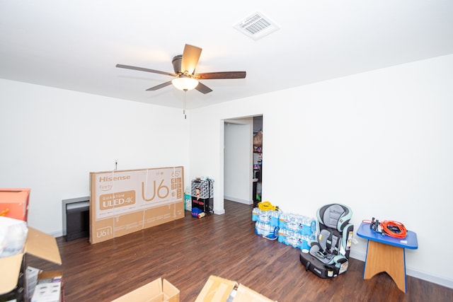 miscellaneous room featuring ceiling fan and hardwood / wood-style floors