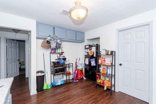 recreation room with dark hardwood / wood-style floors