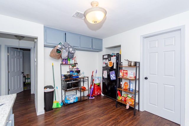 4606 Sharon St, Houston, TX 77020 - interior space featuring visible vents and dark wood-style floors