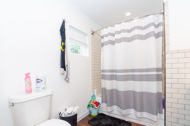 bathroom featuring toilet and hardwood / wood-style floors