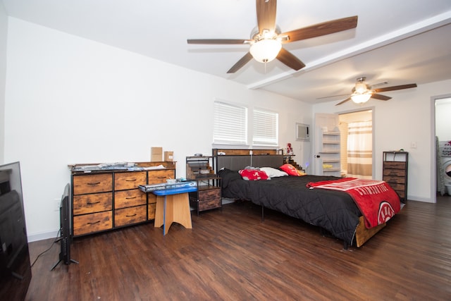 bedroom featuring washer / clothes dryer, dark wood-type flooring, and ceiling fan