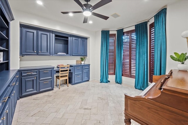 9819 Crestwater Cir, Magnolia, TX 77354 - home office with built in study area, ceiling fan, and recessed lighting