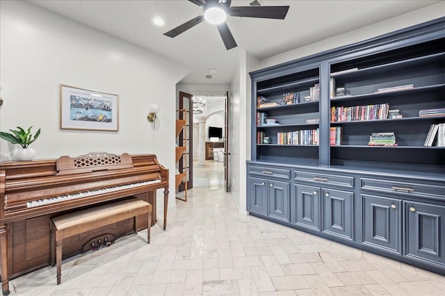 misc room with ceiling fan