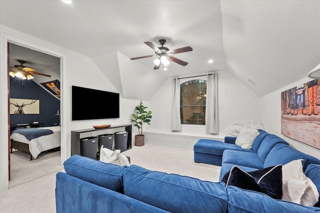 carpeted living room with vaulted ceiling and ceiling fan