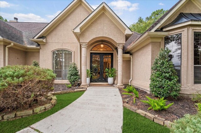 entrance to property featuring french doors