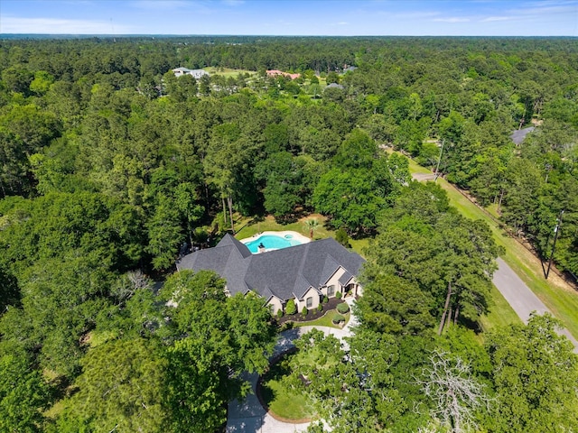 9819 Crestwater Cir, Magnolia, TX 77354 - drone / aerial view of a heavily wooded area