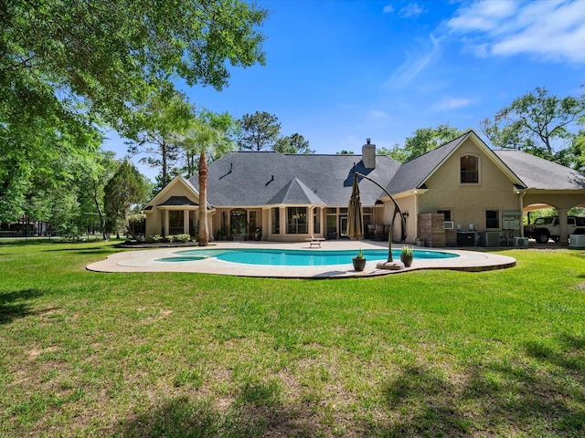 9819 Crestwater Cir, Magnolia, TX 77354 - outdoor pool featuring a yard and a patio area