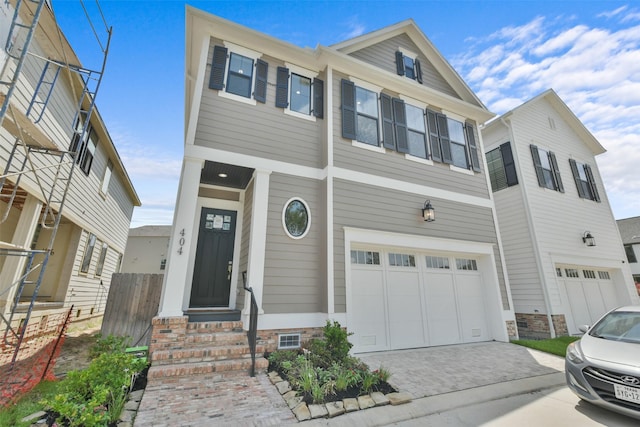 view of front of property with a garage