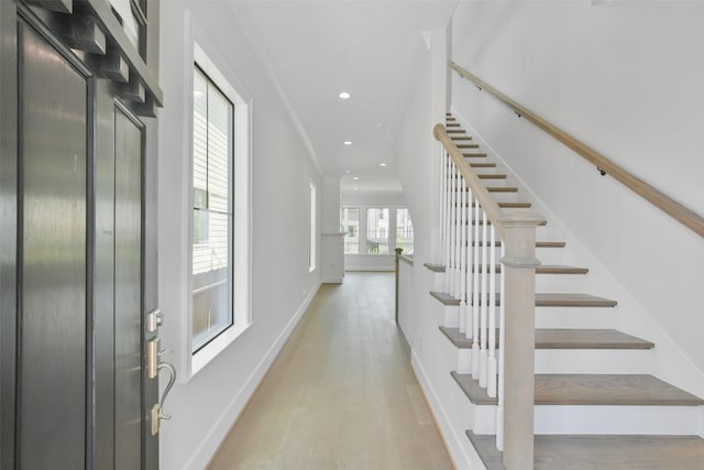 foyer with light wood-type flooring