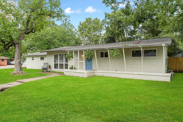 view of front of house with a front lawn