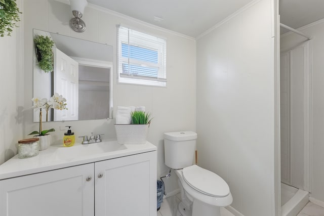 bathroom featuring vanity, walk in shower, crown molding, toilet, and tile patterned flooring