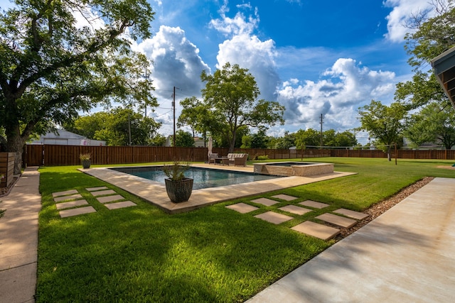 view of swimming pool with an in ground hot tub, a patio area, and a lawn