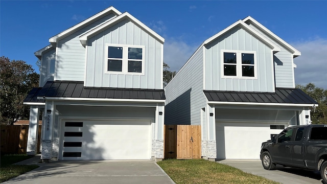 modern farmhouse style home featuring a garage