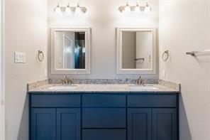 bathroom with double vanity