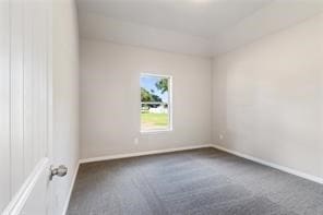 empty room with carpet flooring