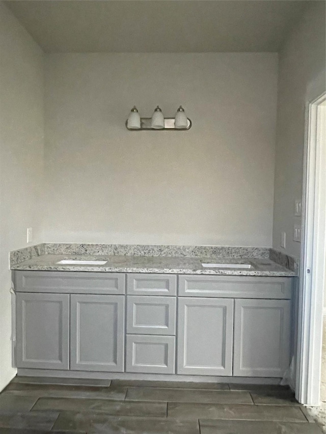 bathroom featuring sink and hardwood / wood-style flooring