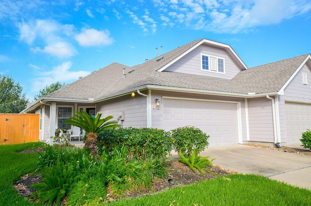 view of side of property with a garage