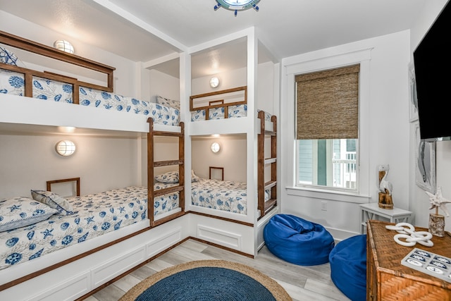 bedroom featuring light wood-type flooring