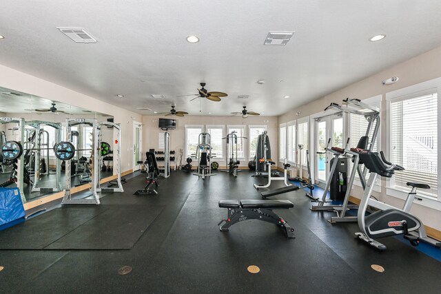 workout area featuring ceiling fan