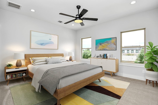 carpeted bedroom with ceiling fan