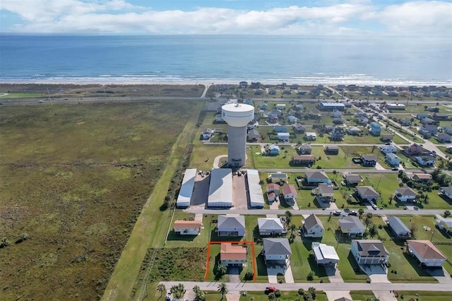 bird's eye view featuring a water view and a residential view