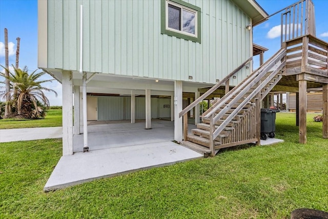 exterior space with driveway and stairs