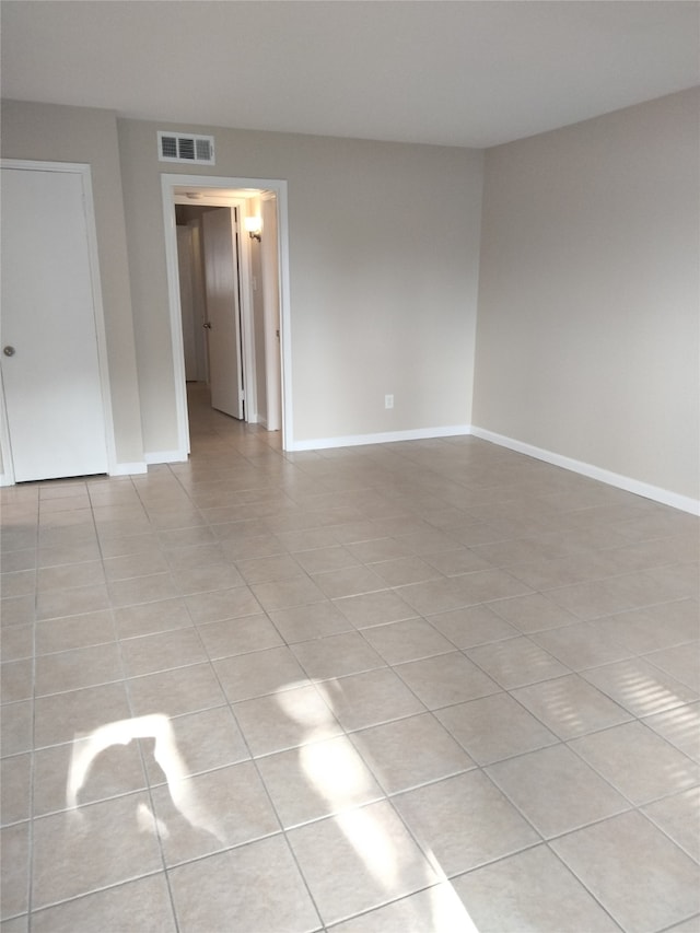 view of tiled spare room