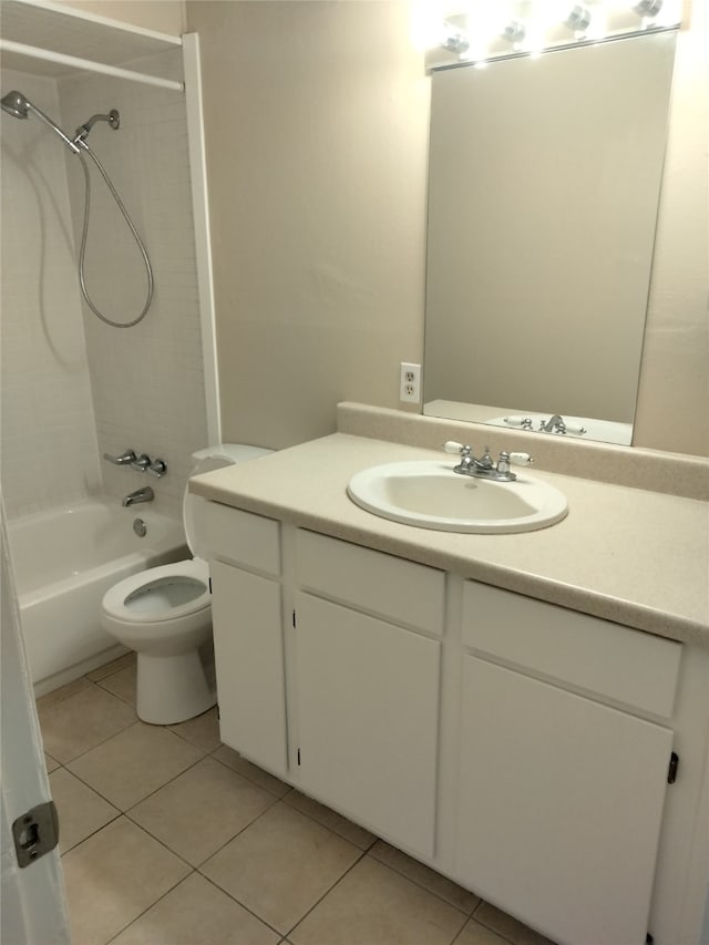 full bathroom featuring vanity, shower / tub combination, toilet, and tile patterned flooring