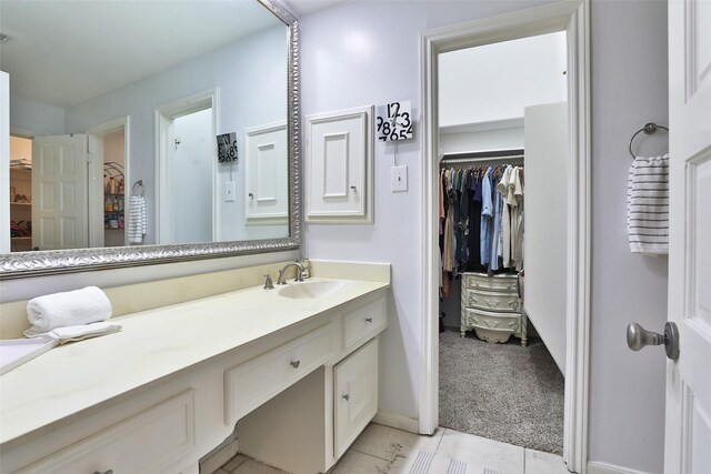 bathroom featuring vanity and tile patterned floors