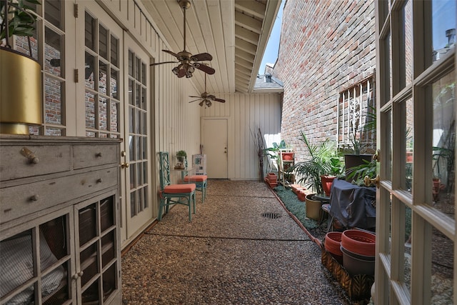 view of patio featuring ceiling fan