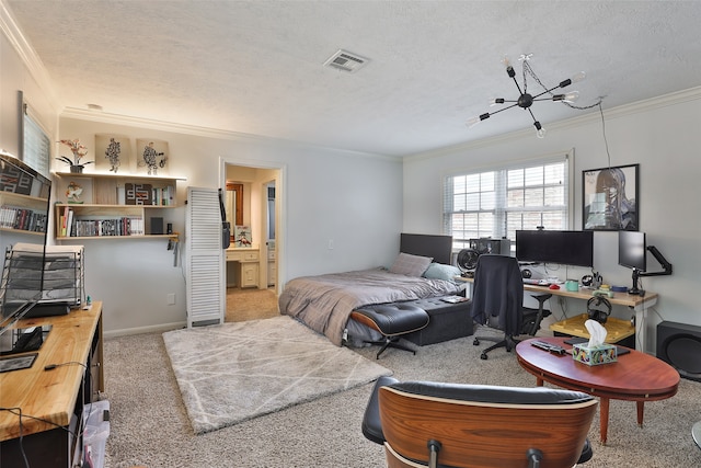 bedroom featuring carpet, a textured ceiling, ensuite bath, and ornamental molding