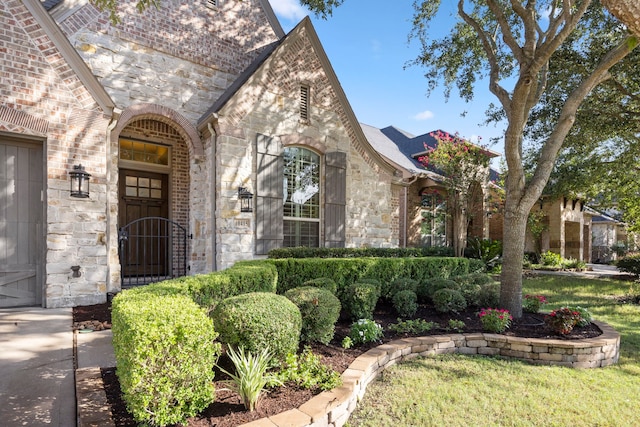 property entrance with a yard