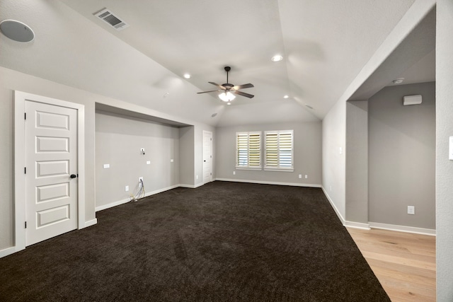 unfurnished living room with lofted ceiling, light hardwood / wood-style floors, and ceiling fan