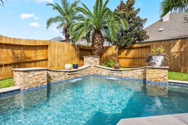 view of pool with pool water feature