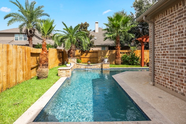 view of swimming pool with pool water feature