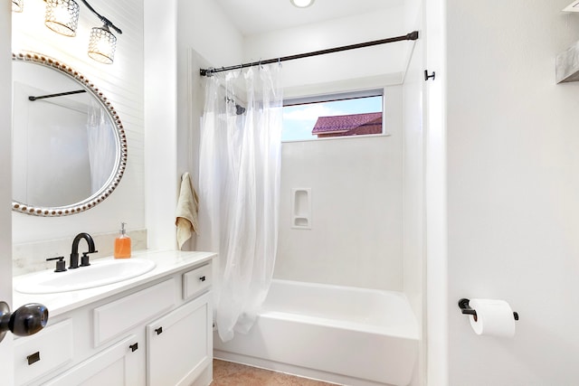 bathroom featuring vanity and shower / bath combo