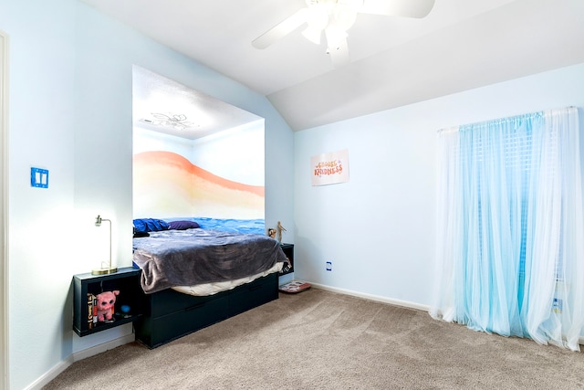 carpeted bedroom featuring vaulted ceiling and ceiling fan