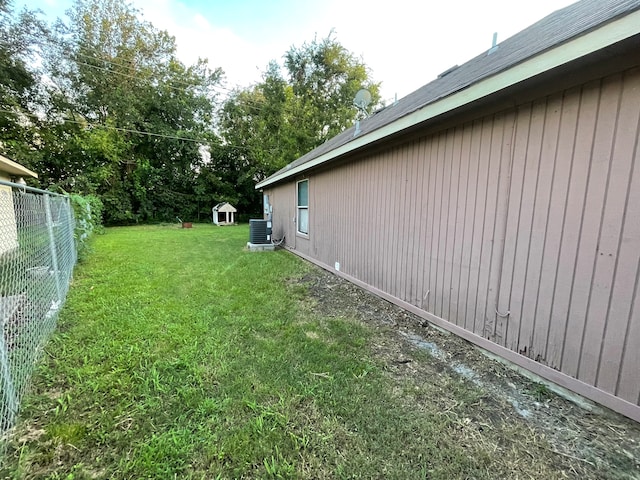 view of yard featuring central AC