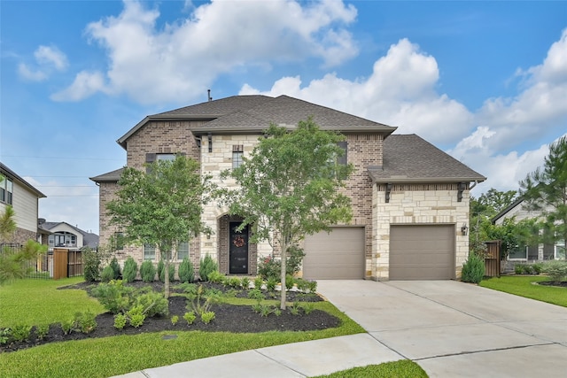 french country style house with a garage